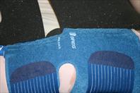 Laura taking off the bandages and re-dressing my knee after my surgery.