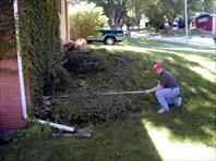 John Wray measuring for the landscaping