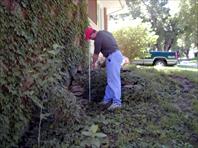 John Wray measuring for the landscaping