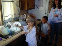 Sydney Hellerich, Adrian Johnson and Susan Hellerich - taken at the house on Maple Drive