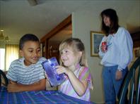 Adrian Johnson, Sydney Hellerich and Susan Hellerich - taken at the house on Maple Drive