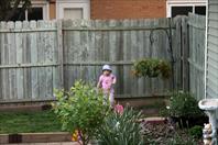 Mary Wray "helping" with the yard work - taken at the house on maple drive May 2009