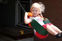 Mary Wray - swinging on Maple Drive, Omaha NE