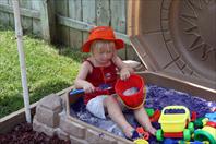 Mary got some crazy purple sand for her sand box!