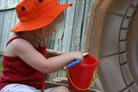Mary got some crazy purple sand for her sand box!