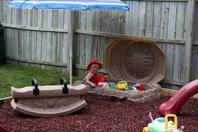 Mary got some crazy purple sand for her sand box!